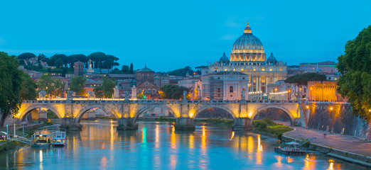 Sant'Angelo bridge and St Peter's Basilica at sunset  - Rome, italy