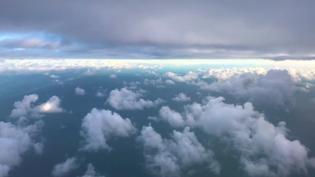 flying in between two different cloud formations,cirrocumulus below and stratos above