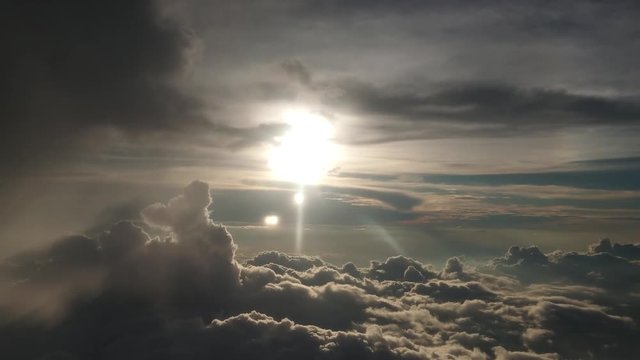 Beautiful blue sky, bright sun and amazing cloud formation