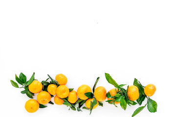 New Year and Christmas Eve with mandarins. Citrus winter fruits on white background top view space for text