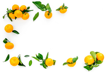 pile of tangerines for New Year and Christmas celebration on white background top view mock up