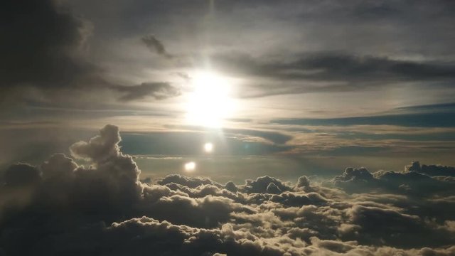 Beautiful blue sky, bright sun and amazing cloud formation