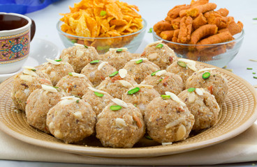 Indian Traditional Sweet Food Urad Dal Laddu Also Know as Laddoo, Ladoo, Laddo are Ball-Shaped Sweets Made of Butter, Dry Fruits, Fenugreek and other Spices. Urad Dal laddu Sweet Mostly Eat in Winter