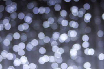 Obraz premium Lights blurred bokeh background from Christmas night party for your design