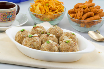 Indian Traditional Sweet Food Urad Dal Laddu Also Know as Laddoo, Ladoo, Laddo are Ball-Shaped Sweets Made of Butter, Dry Fruits, Fenugreek and other Spices. Urad Dal laddu Sweet Mostly Eat in Winter