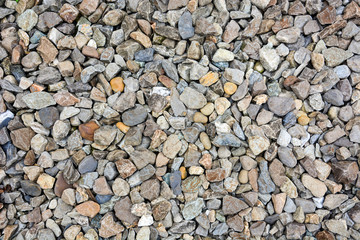 stack of granite gravel on railway, different size and color of pebble texture for background, small stone on railroad texture