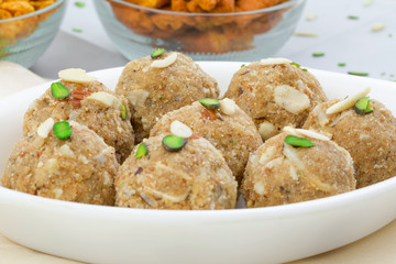 Indian Traditional Sweet Food Urad Dal Laddu Also Know as Laddoo, Ladoo, Laddo are Ball-Shaped Sweets Made of Butter, Dry Fruits, Fenugreek and other Spices. Urad Dal laddu Sweet Mostly Eat in Winter