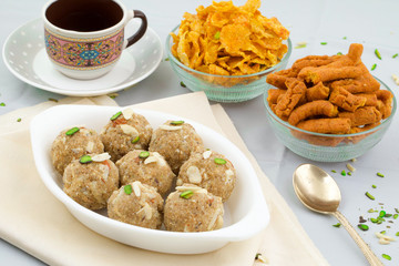 Indian Traditional Sweet Food Urad Dal Laddu Also Know as Laddoo, Ladoo, Laddo are Ball-Shaped Sweets Made of Butter, Dry Fruits, Fenugreek and other Spices. Urad Dal laddu Sweet Mostly Eat in Winter