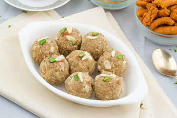 Indian Traditional Sweet Food Urad Dal Laddu Also Know as Laddoo, Ladoo, Laddo are Ball-Shaped Sweets Made of Butter, Dry Fruits, Fenugreek and other Spices. Urad Dal laddu Sweet Mostly Eat in Winter