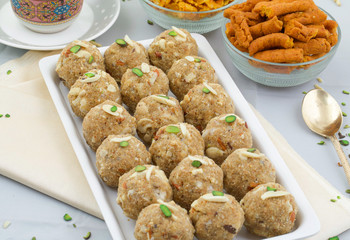 Indian Traditional Sweet Food Urad Dal Laddu Also Know as Laddoo, Ladoo, Laddo are Ball-Shaped Sweets Made of Butter, Dry Fruits, Fenugreek and other Spices. Urad Dal laddu Sweet Mostly Eat in Winter