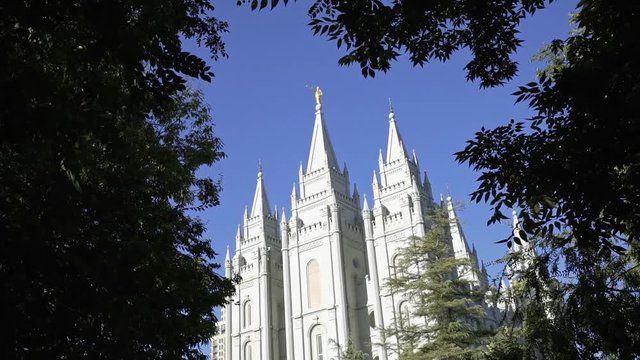 The Salt Lake City Latter Day Saint Temple on a bright summer day.