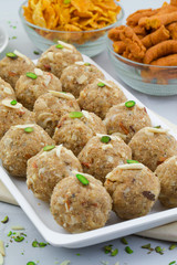 Indian Traditional Sweet Food Urad Dal Laddu Also Know as Laddoo, Ladoo, Laddo are Ball-Shaped Sweets Made of Butter, Dry Fruits, Fenugreek and other Spices. Urad Dal laddu Sweet Mostly Eat in Winter
