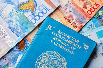 Kazakh money and passport close up