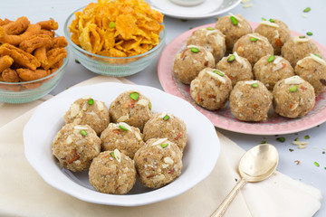 Indian Traditional Sweet Food Urad Dal Laddu Also Know as Laddoo, Ladoo, Laddo are Ball-Shaped Sweets Made of Butter, Dry Fruits, Fenugreek and other Spices. Urad Dal laddu Sweet Mostly Eat in Winter