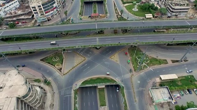 Above view of the Kalma Chowk Bridge and Flyover, one of the busiest areas in Lahore, Pakistan