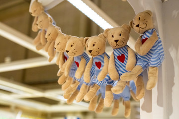 many Teddy bears are suspended