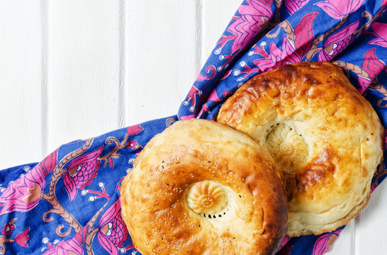 Traditional bread peoples of Central Asia - flat bread, baked in the tandoor oven.