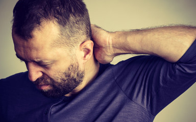 Obraz premium Man having neck ache