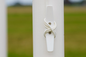 White pin for rolling strings