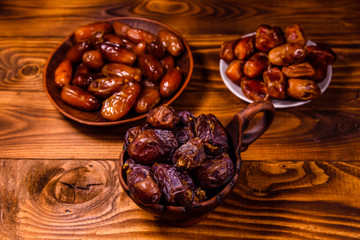 Date fruits on the rustic wooden table