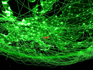 Slovenia on green model of planet Earth with network representing green age, travel and communication.