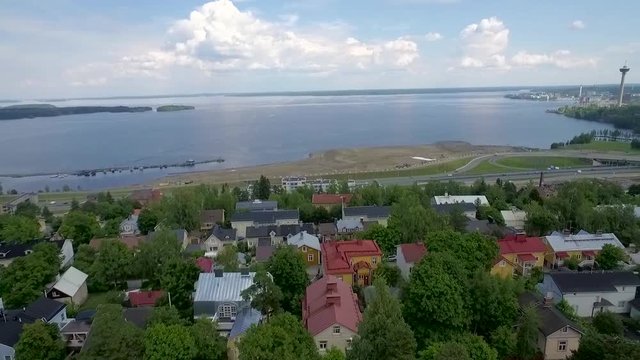 Drone shot of historical Pispala area dividing two lakes, Pyh&radic;&sect;j&radic;&sect;rvi and N&radic;&sect;sij&radic;&sect;rvi, in Tampere and a look over the city center.