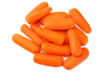 group of organic small baby carrots isolated on a white background. Top view