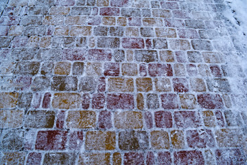 Background of snow pavers on the road in the Park.
