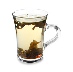 Brewing of tea in cup on white background