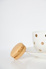 cup of coffee and cookies on white background