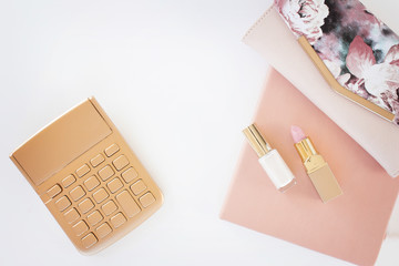 white desk with brown calculator