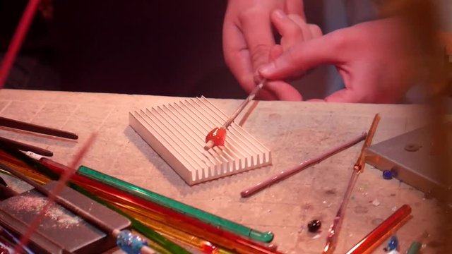 Using a Grooved Marving Pad to Create a Twisted Style Glass Bead