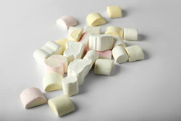 Fototapeta na wymiar Tasty marshmallows on grey background