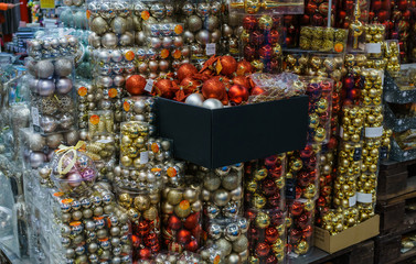Various multicolored Christmas toys and decorations for sale in the store