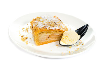 Pie with apples and ice cream isolated on white