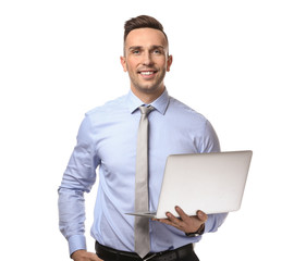 Young businessman with laptop on white background