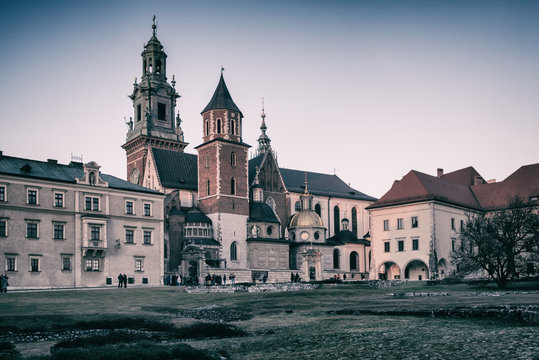 Wawel royal castle in Krakow, medieval fortress, stunning architectural ensemble on the Wawel hill, vintage image, travel outdoor background, Poland, Europe