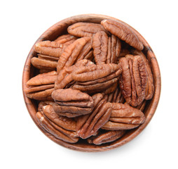 Bowl with pecan nuts on white background
