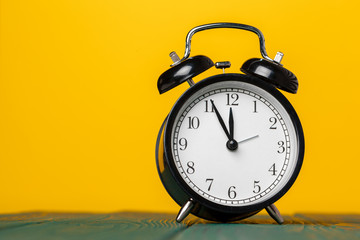 retro alarm clock on table