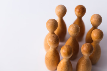 Business team uman resources concept. wooden block figures standing together.