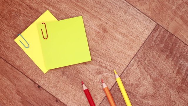 Multicolored pencils beside stickers