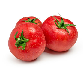 Three ripe  tomatoes isolated on white background