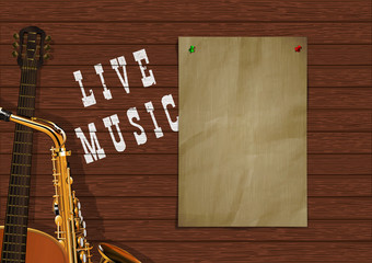 Musical background live music with wooden boards, acoustic guitar, saxophone and a piece of paper for an inscription or image.