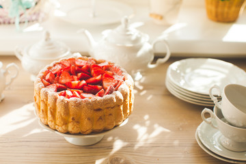 French Fresh Strawberry charlotte and kitchen dishes