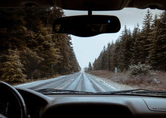 car POV driving down Washington coastal highway © Dillon
