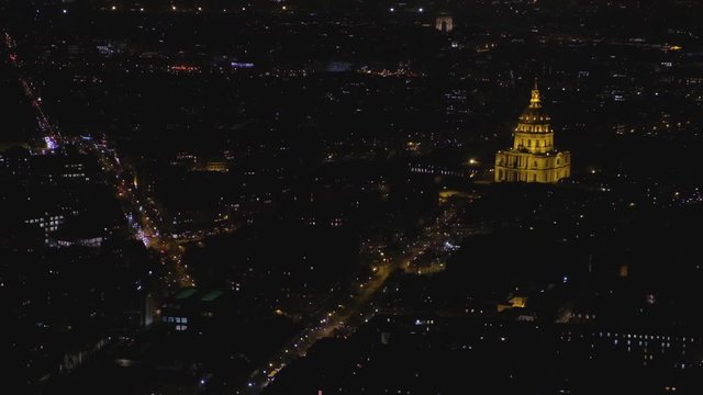 Night view of lit Paris city with Les Invalides building being lit