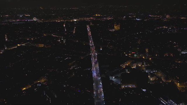Panoramic Bird's eye view of beautifully lit Paris streets at night 
