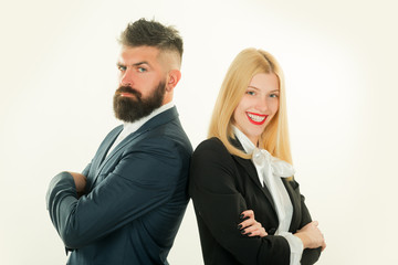 Young man and woman standing back-to-back with crossed hands against white background. Business man concept.
