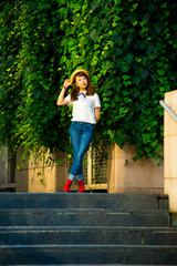 Asian female model poses for pictures on the street