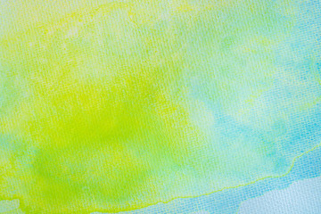 Gradient blue yellow and green watercolor background. Abstract watercolor art of paint on white paper.